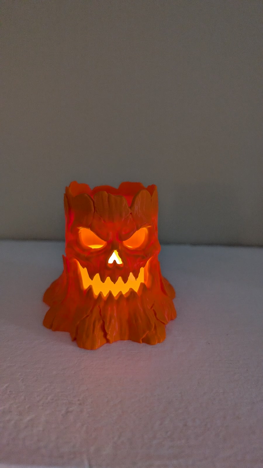 Orange spooky stump glowing from inside