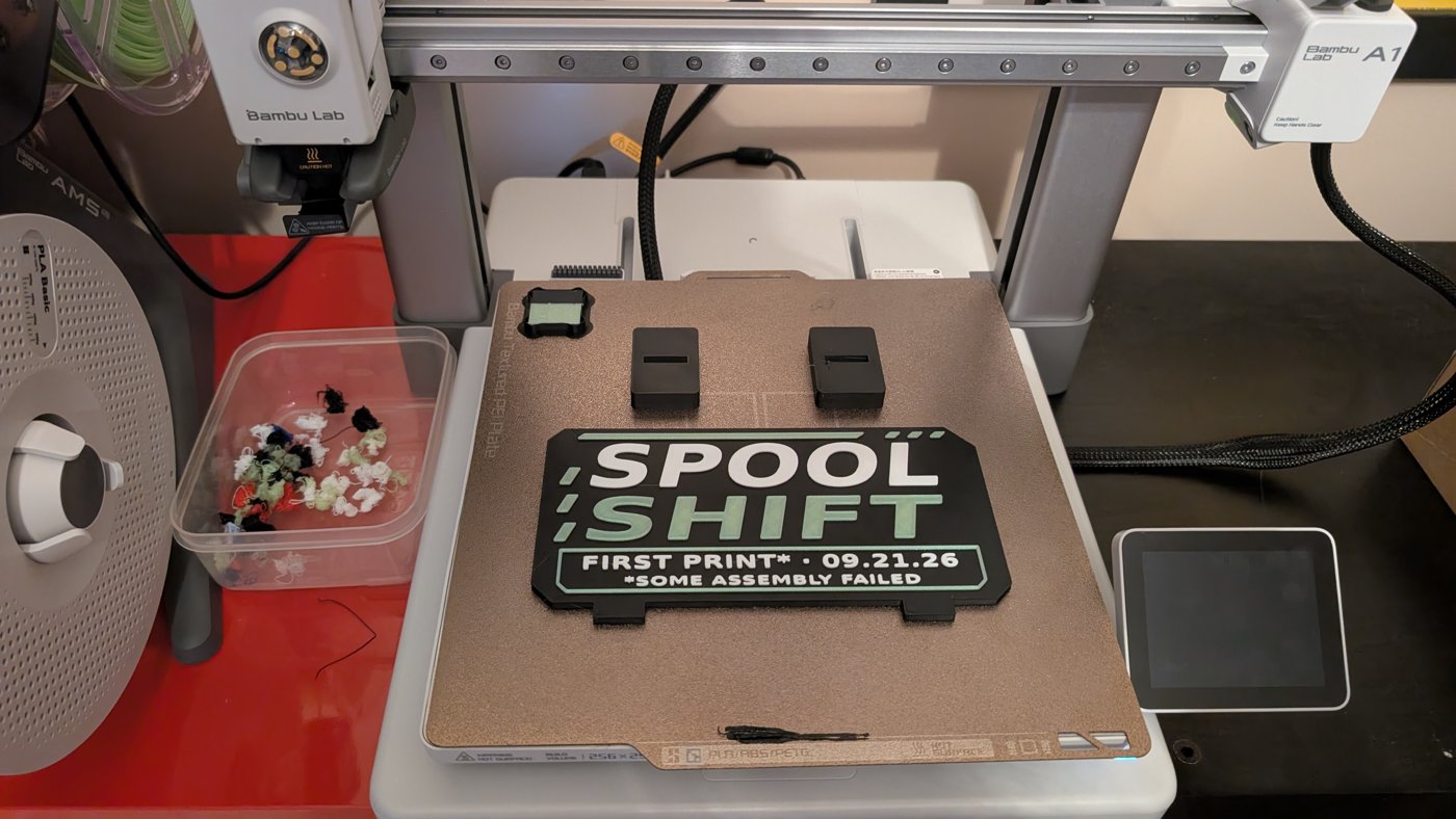 Spool Shift sign on the A1 build plate after printing