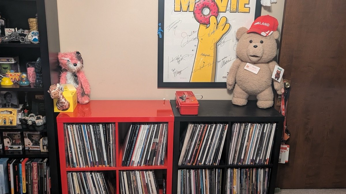 The same record shelves after cleanup, with the red cabinet surface cleared for the printer setup