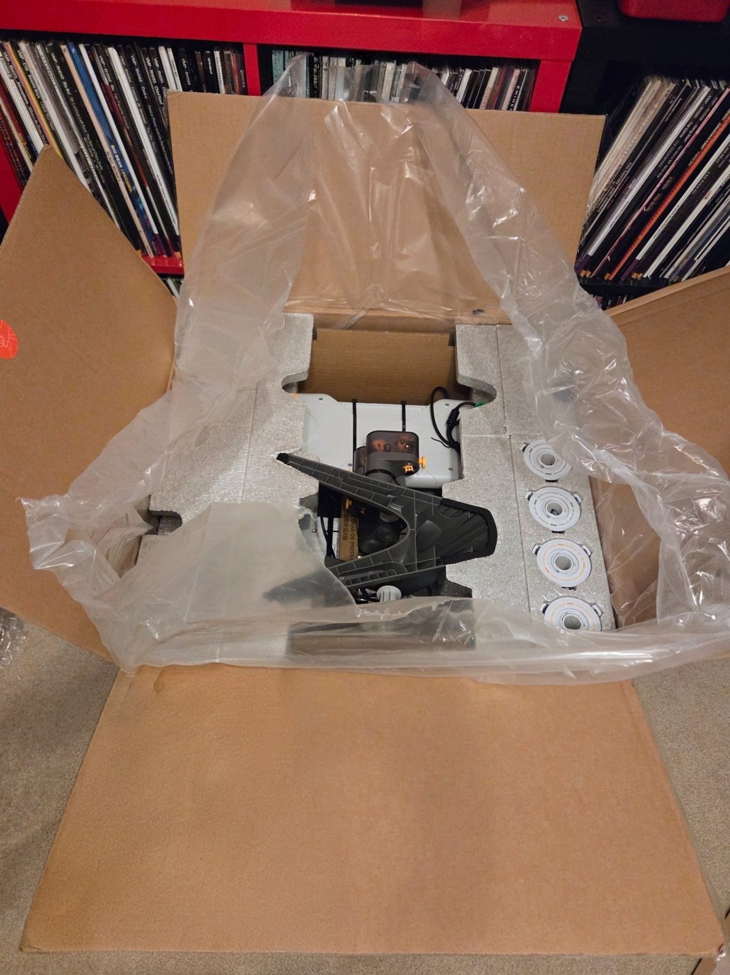 Open Bambu Lab A1 Combo box with the first components nestled in protective packaging
